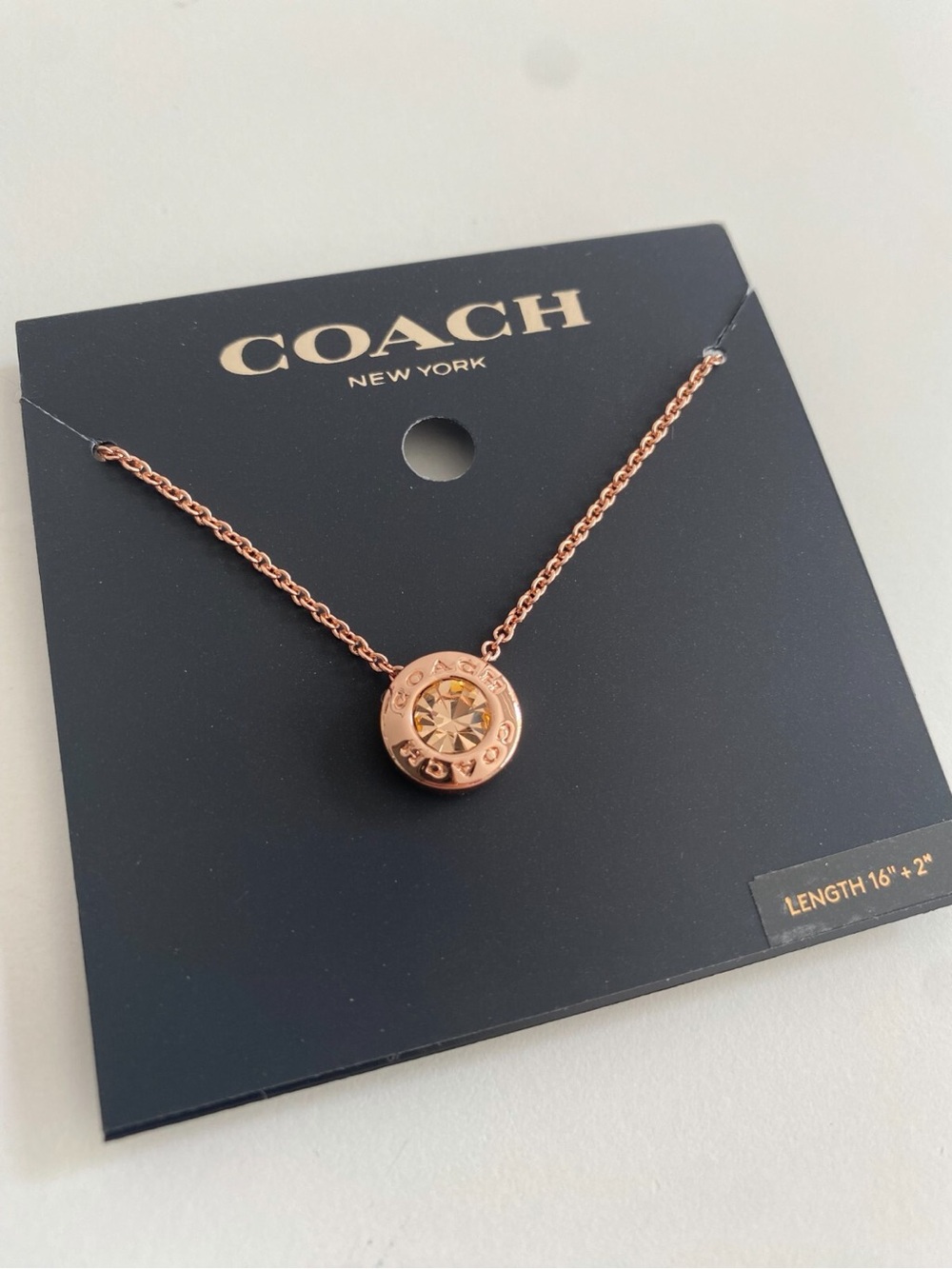 COACH Rose Gold Crystal Disc Necklace